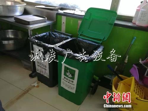 收殘區(qū)的廚余垃圾桶 中新網(wǎng)記者 張尼 攝